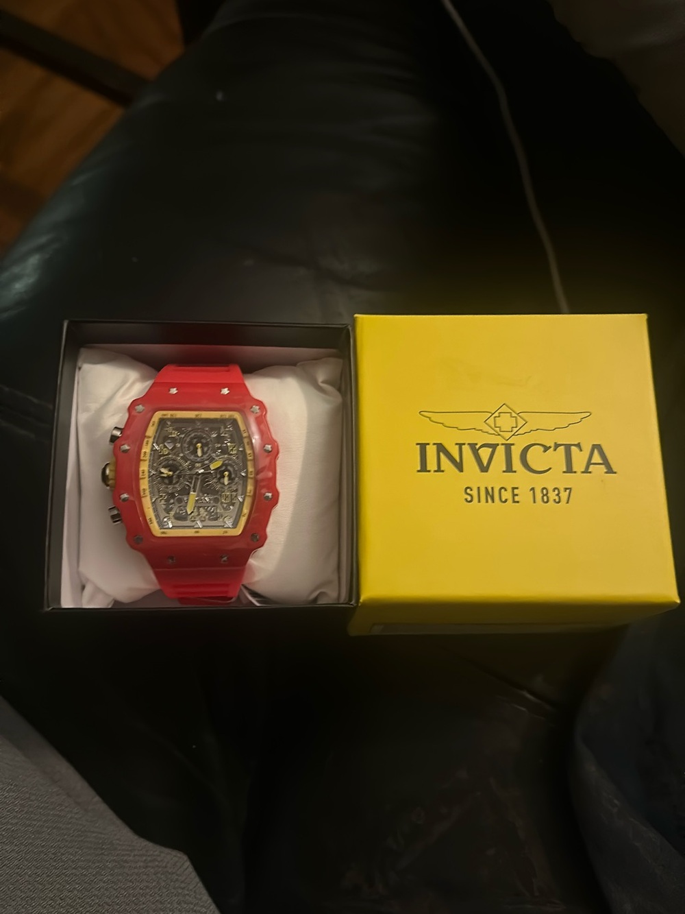 Invicta Red and Yellow Accent Skeleton Dial Watch